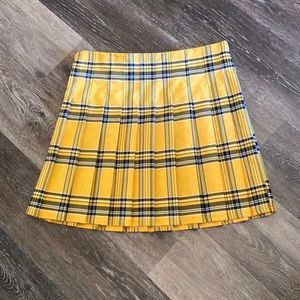 a skirt like Chers from clueless. (Yellow black and white plaid)
